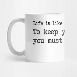 Albert Einstein - Life is like riding a bicycle. To keep your balance you must keep moving Mug